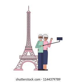 cute grandparents with eiffel tower and pole selfie