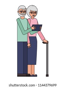 cute grandparents with tablet device