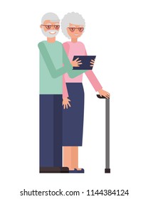 cute grandparents with tablet device