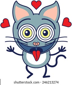 Cute gray cat with big ears, long tail and funny bulging eyes while raising its arms, smiling generously, sticking its tongue out, showing red hearts around its head and feeling madly in love