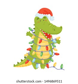 Cute green humanized crocodile is wrapped in a garland. Vector illustration on a white background.