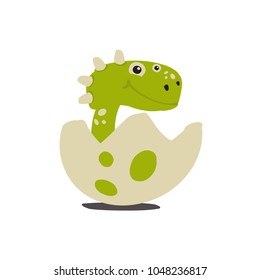 Cute green little dinosaur in cracked egg.