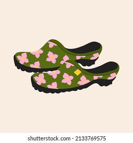 Cute green rubber boots with flower pattern on a beige background. Garden equipment vector flat style illustration