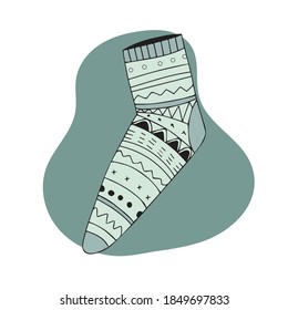 Cute green sock with ornament. Hand-drawn illustration in a linear style. Blot background. Isolated