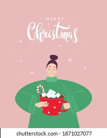 Cute greeting card with lettering "Merry Christmas" and girl in a sweater. A woman drinking cocoa or hot chocolate with marshmallows. - Vector illustration