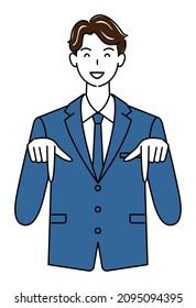 A cute guy in a suit smiling and pointing his finger in the direction below. Business person illustration vector
