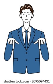 A cute guy in a suit smiling and pointing his finger in the direction below. Business person illustration vector