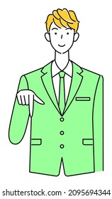 A cute guy in a suit smiling and pointing his finger in the direction below. Business person illustration vector