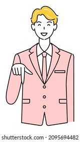 A cute guy in a suit smiling and pointing his finger in the direction below. Business person illustration vector