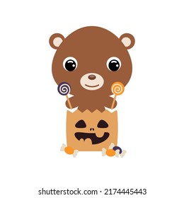 Cute Halloween bear sitting in a trick or treat bag with candies. Cartoon animal character for kids t-shirts, nursery decoration, baby shower, greeting card, invitation. Vector stock illustration