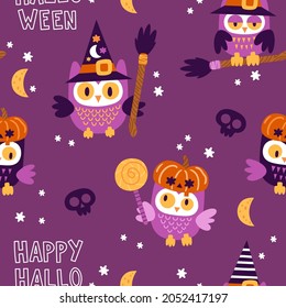 Cute Halloween owls in a witch hat with broom, pumpkin, skull, candy can, moon and groovy stars seamless pattern. Holiday kids design for clothes, paper, cover, fabrics and Halloween party celebration