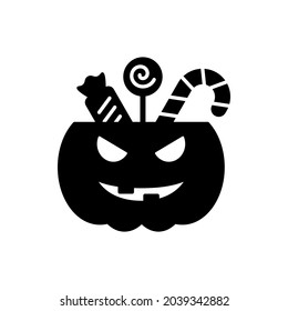 Cute Halloween Pumpkin with Candies Silhouette Icon. Treat or Trick Halloween Pumpkin Bucket Glyph Pictogram. Basket for Sweet on Halloween Icon. Isolated Vector Illustration.