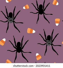 cute halloween seamless vector pattern background illustration with black spiders and candy corn