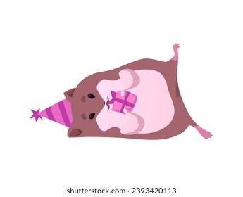 Cute hamster wearing a birthday hat with gift box in his paws lying on his side, flat vector illustration isolated on white background. Funny hamster vector character.