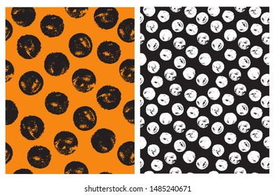 Cute Hand Drawn Abstract Brush Irregular Dots Vector Pattern Set. Black Brush Dots Isolated on an Orange Background. White Spots on a Black. Vivid Color Geometric Design. Simple Dotted Layout.
