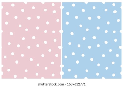 Cute Hand Drawn Abstract Irregular Polka Dots Vector Patterns. White Brush Dots Isolated on a Pastel Pink  and Light Blue Background. Simple Dotted Vector Repeatable Print for Fabric, Wrapping Paper. 