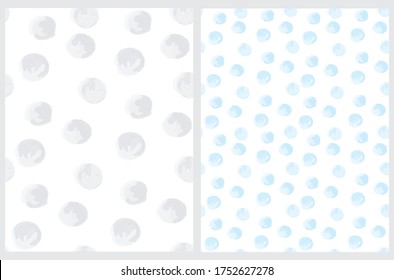 Cute Hand Drawn Abstract Irregular Polka Dots Vector Pattern Set. Light Blue and Light Gray Brush Dots on a White Background. Bright Watercolor Style Vector Print. Simple Dotted Layout.