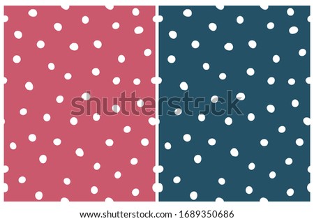 Cute Hand Drawn Abstract Irregular Polka Dots Vector Patterns. White Brush Dots Isolated on a Red and Dark Blue Background. Simple Dotted Vector Repeatable Print for Fabric, Wrapping Paper. 