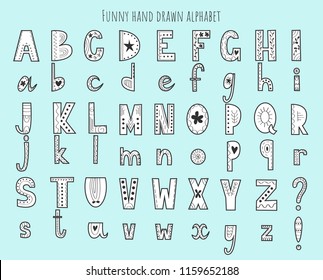 Cute hand drawn alphabet. Vector letters set. Scandinavian style with decorations.