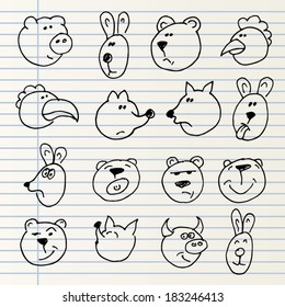 Cute hand drawn animal heads isolated on a notebook page