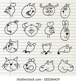 Cute hand drawn animal heads isolated on a notebook page
