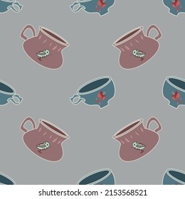 Cute hand drawn cartoon style teacups in pink and blue scattered on a grey background