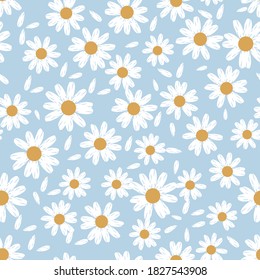 Cute hand drawn daisies pattern and flying petals on a blue background vector illustration.