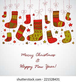 cute hand drawn decorative abstract Christmas socks in red and green colors hanging on ropes with stars and sparkles