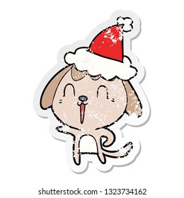 cute hand drawn distressed sticker cartoon of a dog wearing santa hat