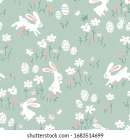 Cute hand drawn Easter seamless pattern with bunnies, Easter eggs and flowers. Great for Easter Cards, banner, wallpaper, textiles, wrapping- vector design