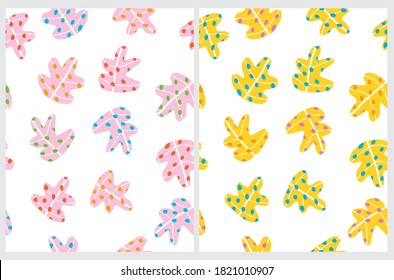 Cute Hand Drawn Floral Vector Patterns. Yellow and Pink Leaves and Colorful Dosts Isolated on a White Background. Infantile Style Autumn Leaves Vector Print.