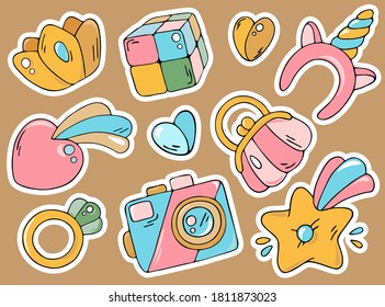 Cute hand drawn girl stuff doodles. Colorful little princess things collection vector illustrations. Beautiful icons for graphic design, typography, stationery, decor, textile.