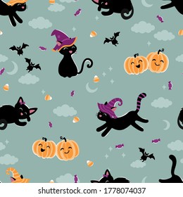 Cute hand drawn halloween seamless pattern with cats and candy, fun background, great for textiles, banners, wallpaper, wrapping - vector design
