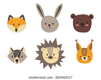 Cute hand drawn heads of forest animals. Fox, hare, bear, wolf, hedgehog, squirrel. White background, isolator. Vector illustration.