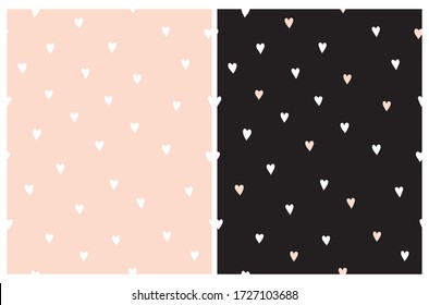 Cute Hand Drawn Irregular Hearts Seamless Vector Pattern. White Tiny Hearts Isolated on a Light Salmon Pink Background. Pastel Pink and White Hearts on a Black Layout. Funny Romantic Print.
