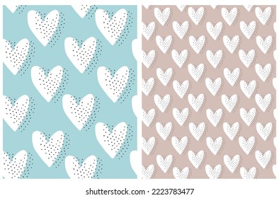 Cute Hand Drawn Irregular Seamless Vector Patterns with Sketched Hearts. Tiny White Hearts and Black Dots on a Light Blue and Beige Background. Infantile Style Romantic Print with Love Symbols.