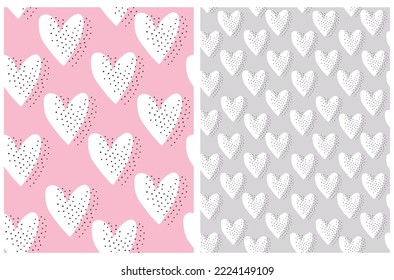 Cute Hand Drawn Irregular Seamless Vector Patterns with Sketched Hearts. Tiny White Hearts and Black Dots on a Light Pink and Gray Background. Infantile Style Romantic Print with Love Symbols.