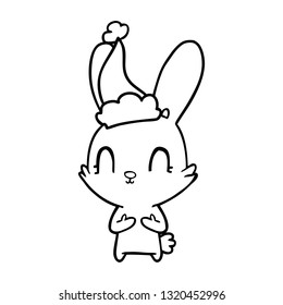 cute hand drawn line drawing of a rabbit wearing santa hat