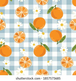 cute hand drawn orange fruit and slice on blue plaid background seamless pattern