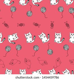 Cute hand drawn  pattern background with kittens , fish bones, mice and yarn balls. Perfect for scrap booking , textile nursery and home decor projects.