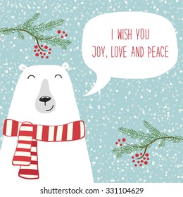 Cute hand drawn polar bear with speech bubble and hand written text I Wish You Joy, Love and Peace on snowy background