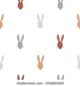 Cute hand drawn rabbit heads seamless pattern. Easter print for wallpaper or fabric. Vector illustration.