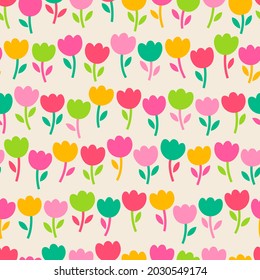 Cute hand drawn row of tulips seamless  pattern background.