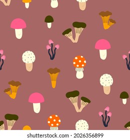 Cute hand drawn seamless pattern of colorful mushroom. Vector illustration for fabric or wrap paper design.