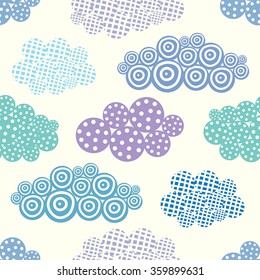 Cute hand drawn seamless pattern with decorative clouds.Vector illustration
