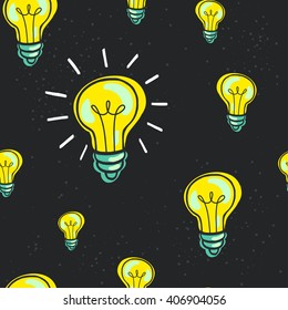Cute hand drawn seamless pattern with doodle light bulbs. Cartoon tiling background.