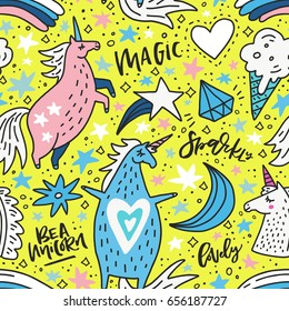 Cute hand drawn seamless pattern with unicorns and rainbows. Vector background