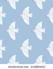 Cute Hand Drawn Seamless Vector Pattern with Dove Holding 
a Little Orange Heart.Sweet Nursery Art for Fabric, Textile,Wrapping Paper. Simple Print with White Flying Birds on a Light Blue Background. 