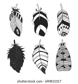 Cute hand drawn set of different feathers. Bird feather collection in doodle style. Vector illustration