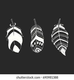 Cute hand drawn set of different feathers. Bird feather collection in doodle style. Vector illustration.